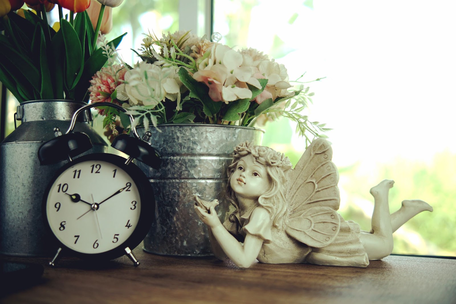 clock angel flower